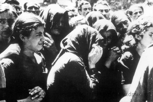 The women of Kalavrita, mourning for their relatives two years after the tragic events at the first memorial service, 1945. Municipal Museum for the Holocaust of Kalavrita