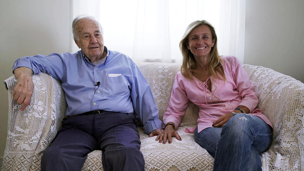 Shoah survivor Isaak Mizan with his daughter. Photo: Dimitris Polidoropoulos